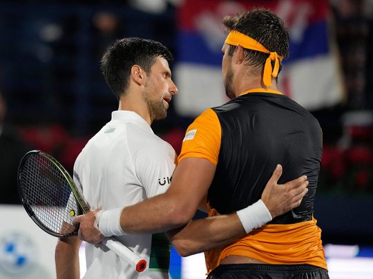 Novak Djokovic congratulates Jiri Vesely