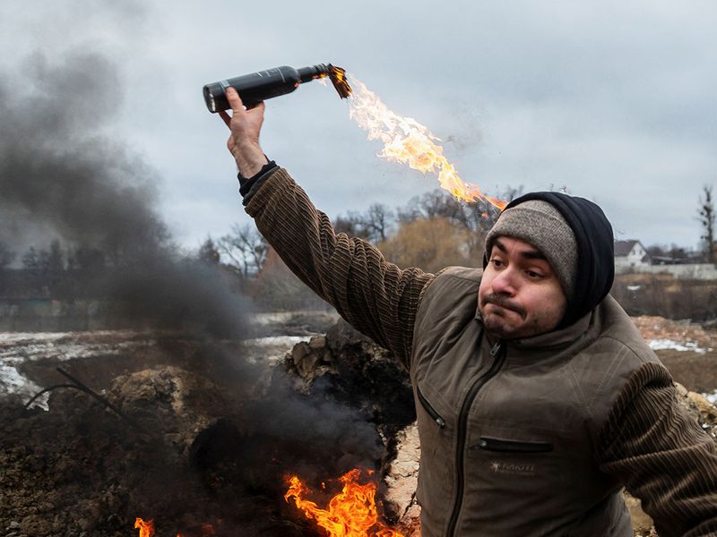 A civilian trains to throw Molotov cocktails to defend the city, as Russia's invasion of Ukraine continues, in Zhytomyr, Ukraine on March 1, 2022.  