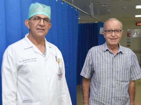 Dr Muwafak Salman (L) with the patient (R) in Al Ain 
