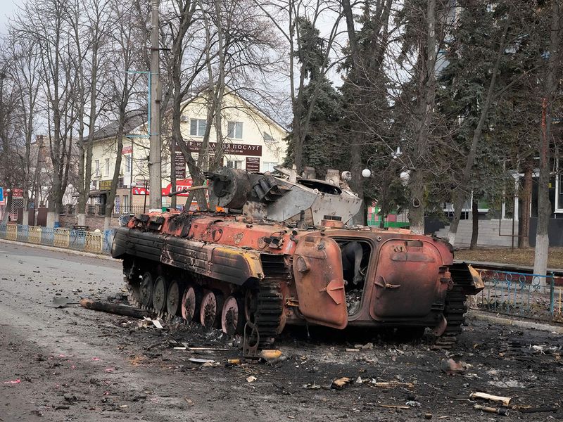 A destroyed armoured personnel carrier stands in the central square of the town of Makariv, 60 kilometres west of Kyiv. 
