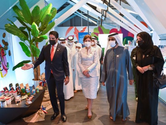 Sheikh Mohammed bin Rashid Al Maktoum with Raquel Peña, Vice President of the Dominican Republic, at her country's pavilion at Expo