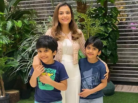 Ambreen with her twin eight-year-olds