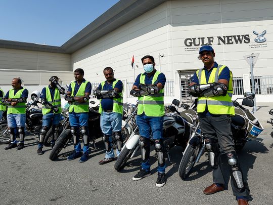 Gulf News delivery bike riders 