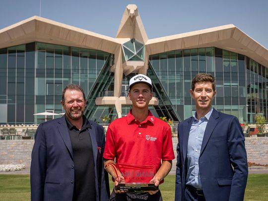 Toby Bishop, winner of the Abu Dhabi Golf Club Men's Open, with Matty Dolan and Andrea Faldella of ADGC