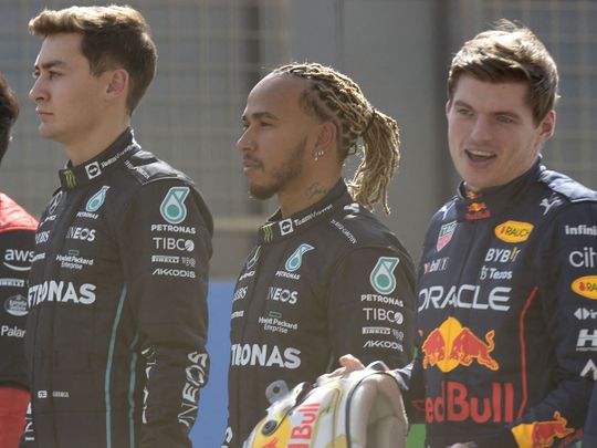 Max Verstappen alongside Lewis Hamilton and George Russell