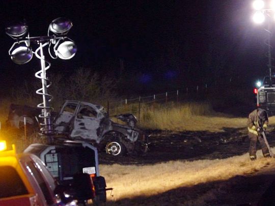 Emergency services at the scene of a fatal crash in Andrews County, Texas. A vehicle carrying members of the University of the Southwest's golf teams collided head-on with a pickup truck 