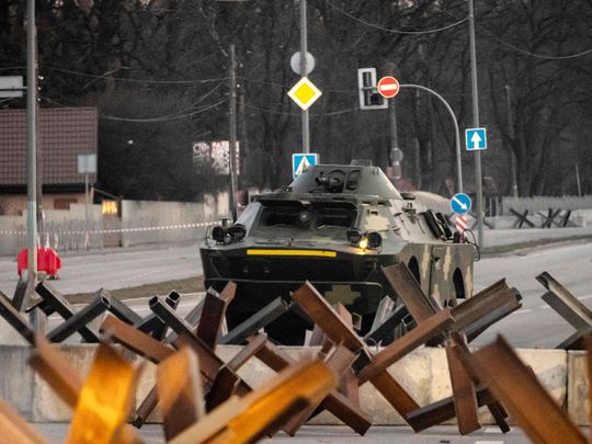 A Ukranian armoured vehicle drives along a road in the Ukranian capital Kyiv on March 19, 2022.  