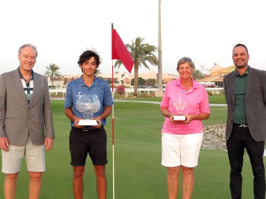 Victor Pena Cortes, second left,  with the Abu Dhabi City Golf Club Championship trophy