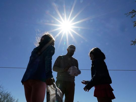 Dustin Johnson signs autographs during practice for the WGC-Dell Technologies Match Play Championship 