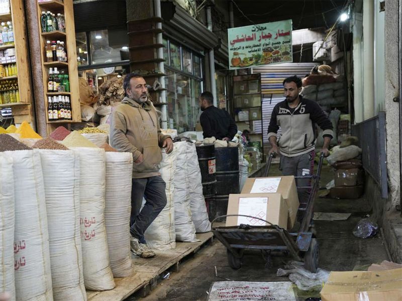 A shopkeeper waits for customers in the main Shurja market in central Baghdad, Iraq. 