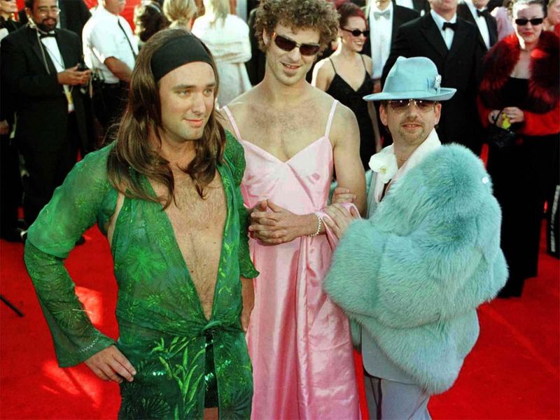 Marc Shalman, [R] with South Park creators, Matt Stone [centre] wearing a dress in the stye of Gwyneth Paltrow's outfit from last year's Oscars and Trey Parker, wearing a dress similar to those worn by Jennifer Lopez and Geri Halliwell. * ... arriving for the 72nd Annual Academy Awards [The Oscars] at the Shrine Auditorium in Los Angeles, USA 