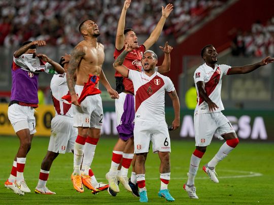 Peru's players celebrate winning 2-0 against Paraguay 