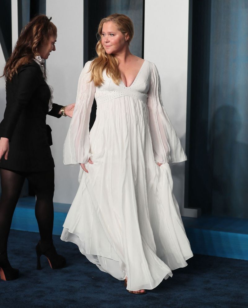 Amy Schumer arrives at the Vanity Fair Oscar party during the 94th Academy Awards in Beverly Hills, California, U.S., March 27, 2022.