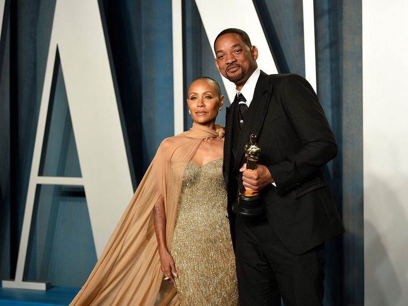 Jada Pinkett Smith, left, and Will Smith arrive at the Vanity Fair Oscar Party on Sunday, March 27, 2022, at the Wallis Annenberg Center for the Performing Arts in Beverly Hills, Calif. The stunning physical altercation between actor Will Smith and comedian Chris Rock at the 94th Academy Awards on Sunday has sparked debate about the appropriate ways for Black men to publicly defend Black women against humiliation and abuse.