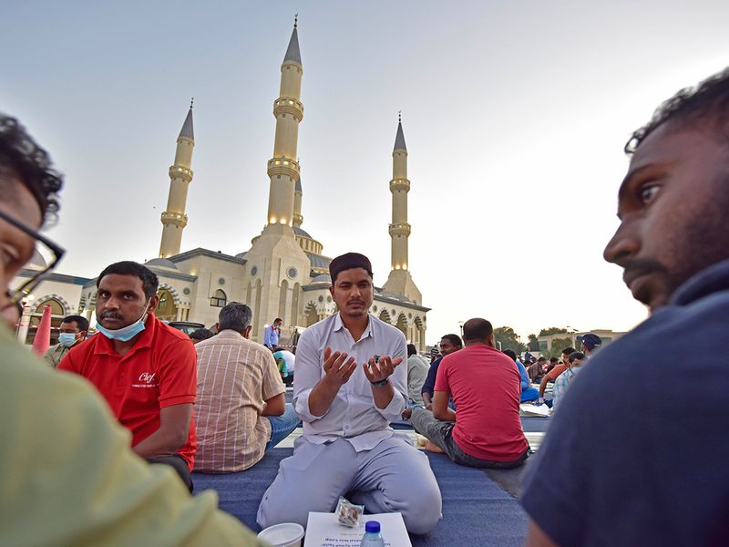 People enjoy their Iftar meals at the Al Farooq Omar Bin Al Khattab Mosque in Dubai on April 2nd, 2022. 