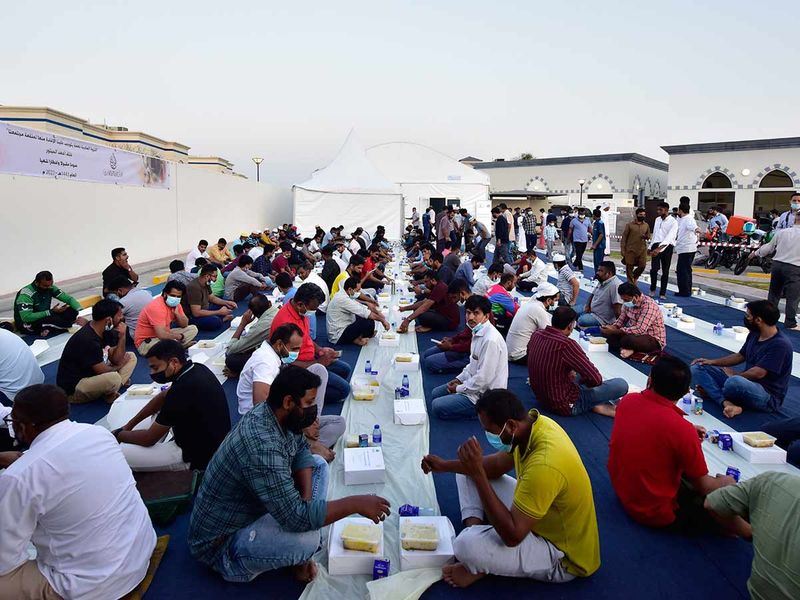 People enjoy their Iftar meals at the Al Farooq Omar Bin Al Khattab Mosque in Dubai on April 2nd, 2022. 