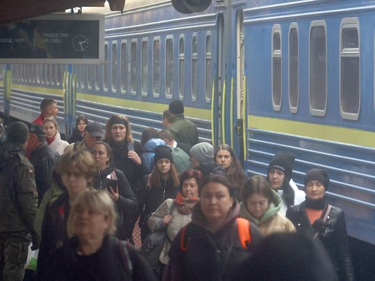 Ukrainian refugees arrive at Przemysl Glowny train station, in Poland.