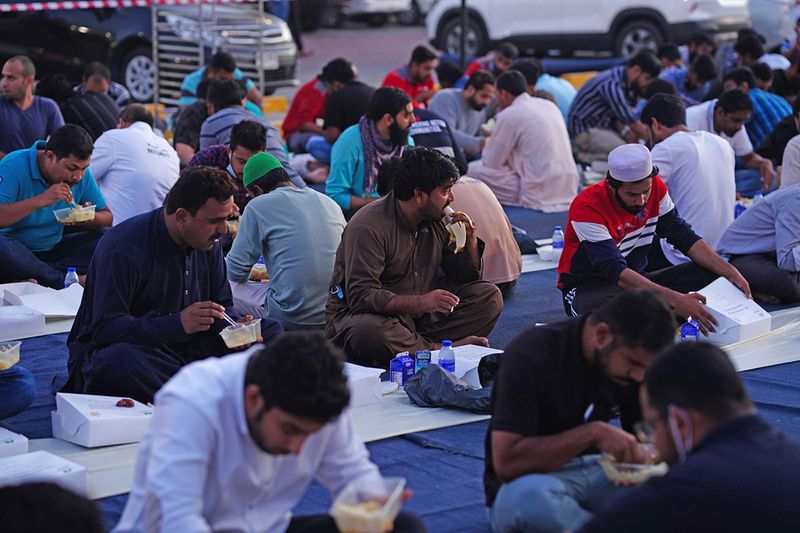 People enjoy their Iftar meals at the Al Farooq Omar Bin Al Khattab Mosque in Dubai on April 2nd, 2022. 
