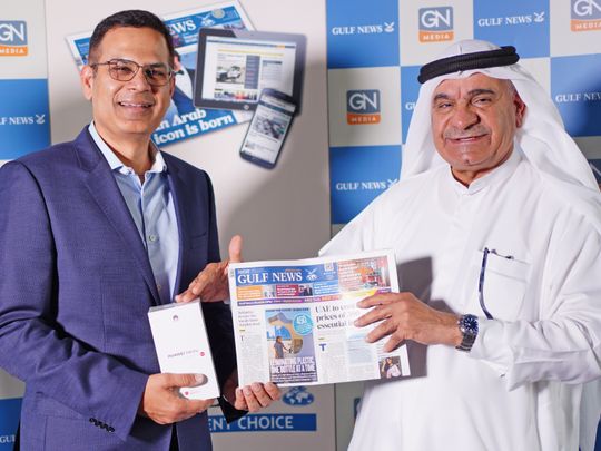 Pankaj Kundra, Gulf News reader (left) and Gulf News CEO and Editor-in-Chief Abdul Hamid Ahmad (right)