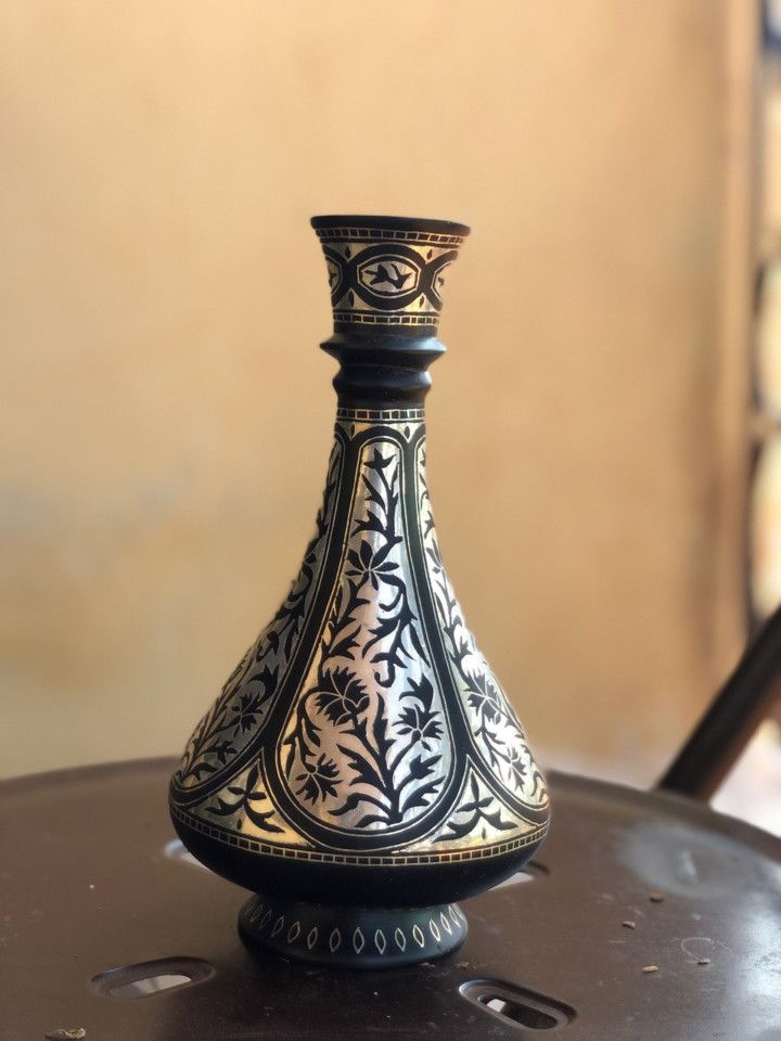 A traditional silver-overlaid Bidri flower vase.-1651830259749
