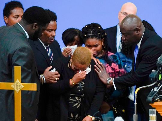Tiffany Whitfield, a granddaughter of Ruth Whitfield, a victim of shooting at a supermarket, is overwhelmed with emotion during a news conference in Buffalo, N.Y., Monday, May 16, 2022.