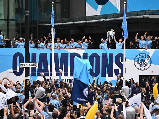 Look: Champions Manchester City paint town blue with open top bus ...