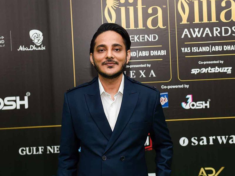 Singer and composer Tanishk Bagchi is on the green carpet at the IIFA Rocks event in Abu Dhabi  