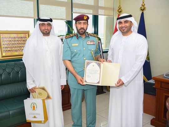 Brigadier-General-Abdullah-Khamis-Al-Hadidi-honoured-Nader-Ali-Kassin-and-Abdullah-Ali-Kassin-1654351269216