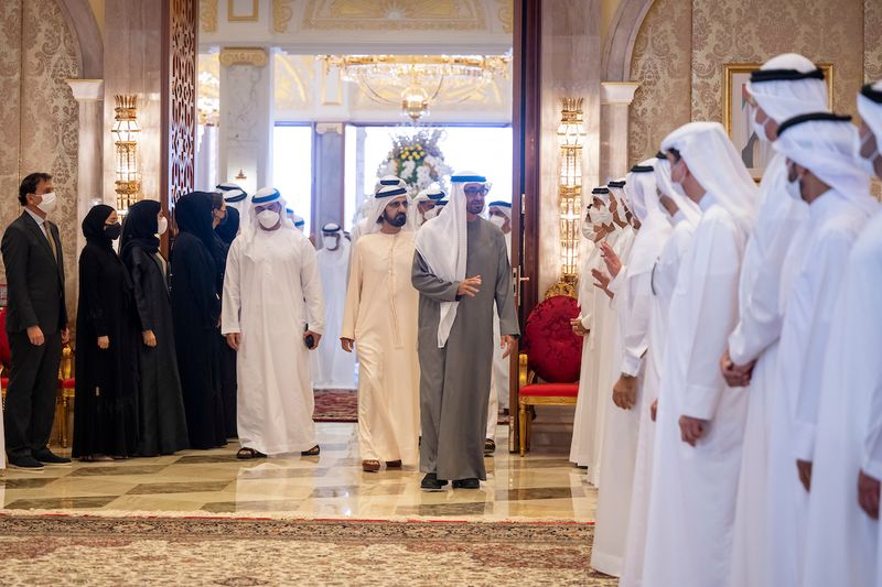 Shaikh Mohamed Bin Zayed greets guests during a reception hosted by Shaikh Mohammed Bin Rashid Al Maktoum