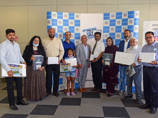 K C Nissar, Gulf News Director – HR, Potru Raju, Gulf News Director for Circulation Sales and Distribution with the winners of the Gulf News bundle subscription offer. 