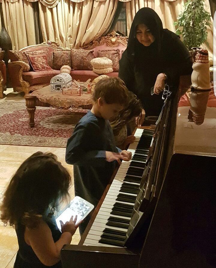 Mona Al Mansouri finds time to spend with her grandchildren.