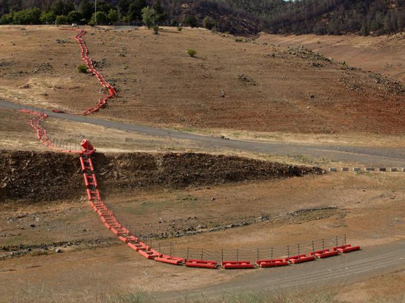 A floating security barrier is seen at a section that used to be underwater at Lake Oroville, which is the second largest reservoir in California, near Oroville, California. 
