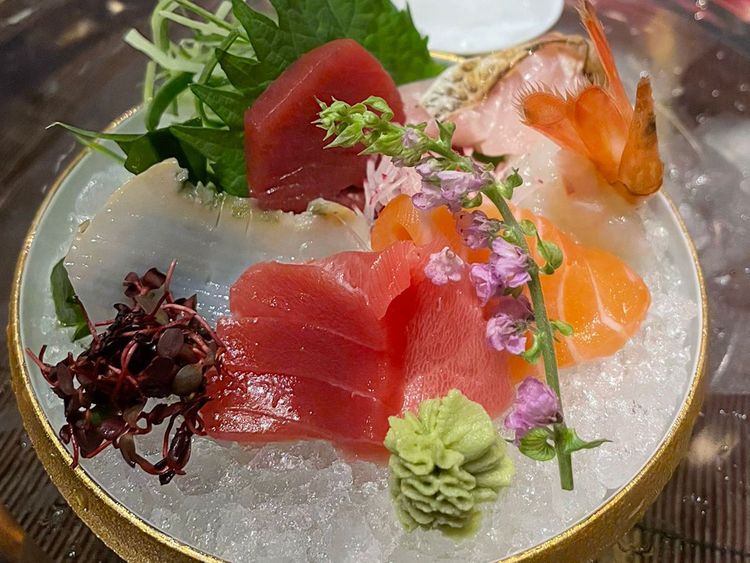 Assorted Hidemasa premium sashimi on ice: Fatty Tuna, Akami, Botan shrimp, Salmon, Black throat, Abalone