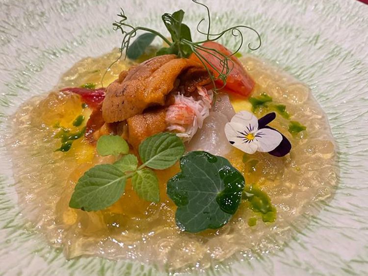 Flounder, snowcrab, fruits, tomato, sweet corn puree and tomato jelly, sea urchin and chives.