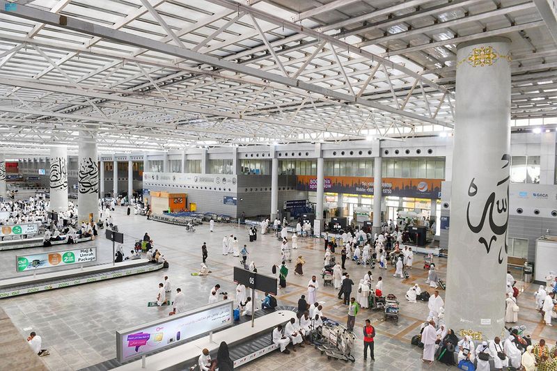 Muslims are seen at baggage hall upon their arrival for the annual Haj pilgrimage at King Abdulaziz International Airport, Jeddah, Saudi Arabia, June 28, 2022. 