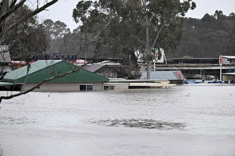 A general view shows a flooded area from the overflowing Hawkesbury river due to torrential rain in the Windsor suburb of Sydney on July 4, 2022. 