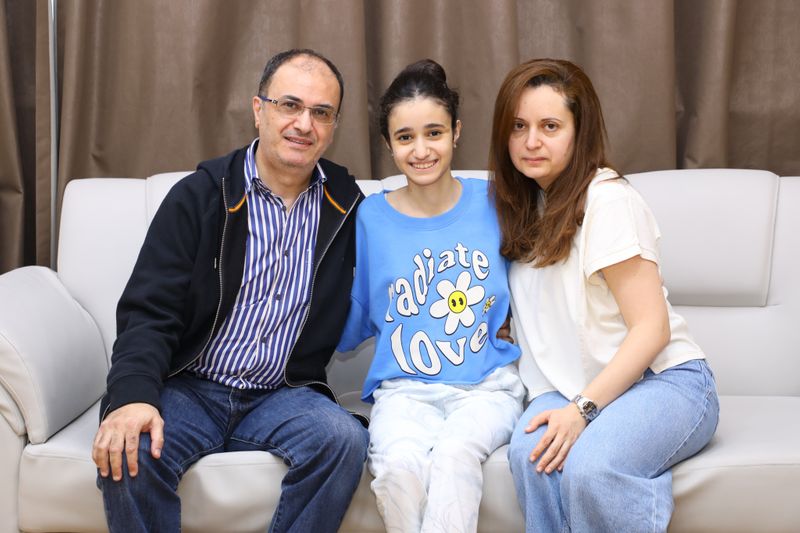 Salma Naser Nawayseh with her parents-1657085228843