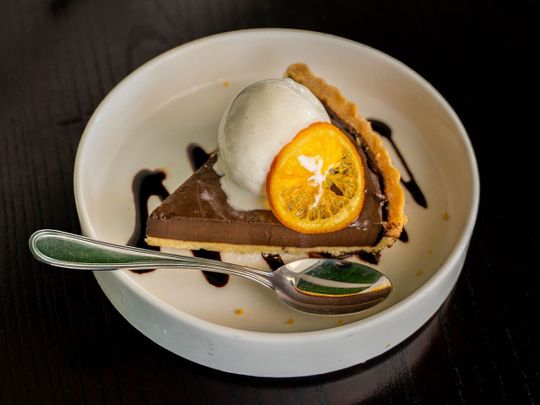Chocolate tart with vanilla ice cream
