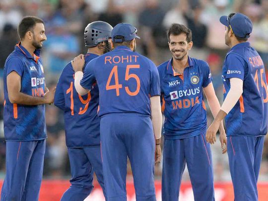 India's Yuzvendra Chahal (2nd R) celebrates with teammates after taking the wicket of England's Moeen Ali during the first Twenty20 International cricket match between England and India at Ageas Bowl in Southampton on July 7, 2022. 