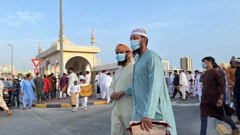 Residents arrive to perform prayers at Eid Musalla in Sharjah. 
