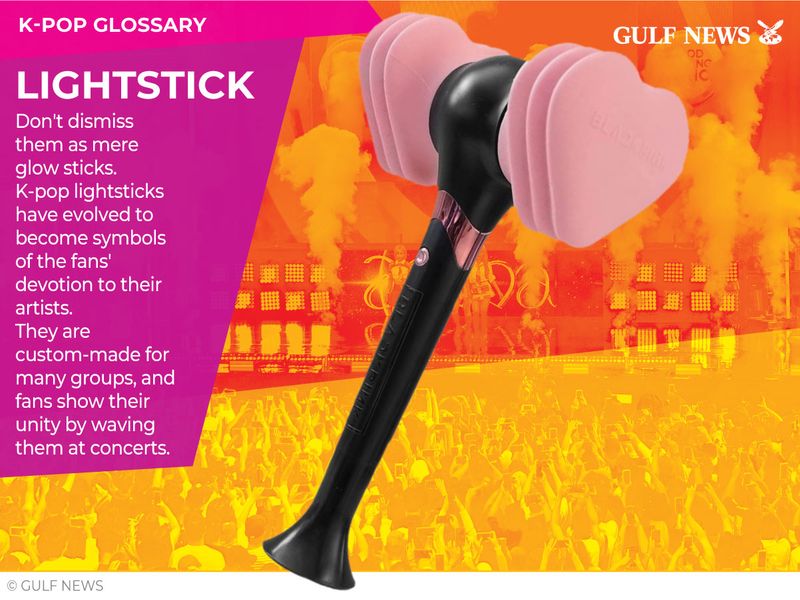 Lightstick: Don’t dismiss them as mere glow sticks. K-pop lightsticks have evolved to become symbols of the fans’ devotion to their artists. They are custom-made for many groups, and fans show their unity by waving them at concerts.
