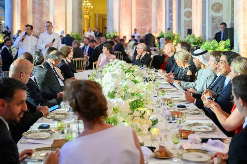 Sheikh Mohamed attends a dinner reception, hosted by Emmanuel Macron, at the Versailles Grand Trianon.