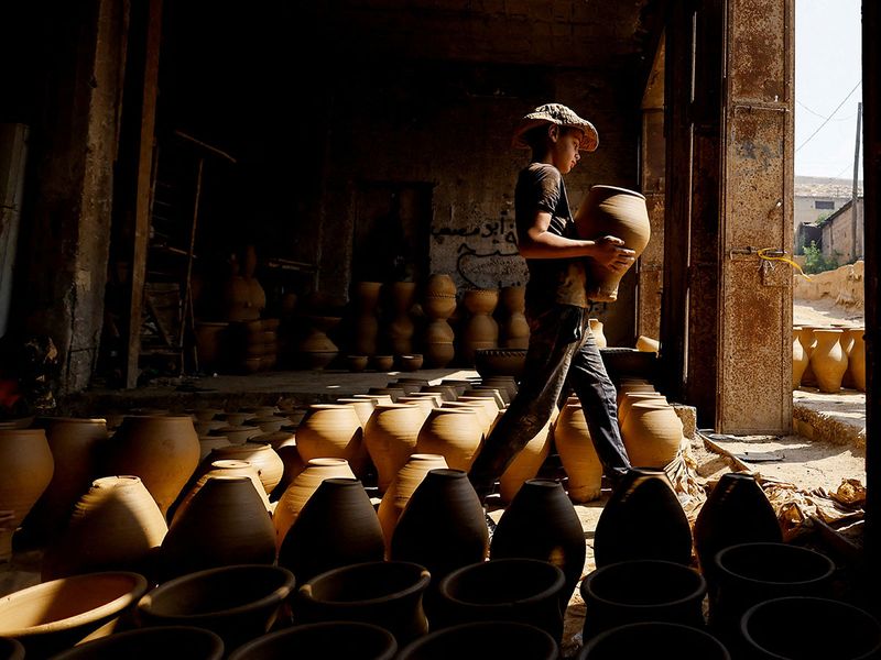 2022-08-04T134744Z_531770630_RC2LPV9735N3_RTRMADP_3_PALESTINIANS-HEBRON-POTTERY-(Read-Only)