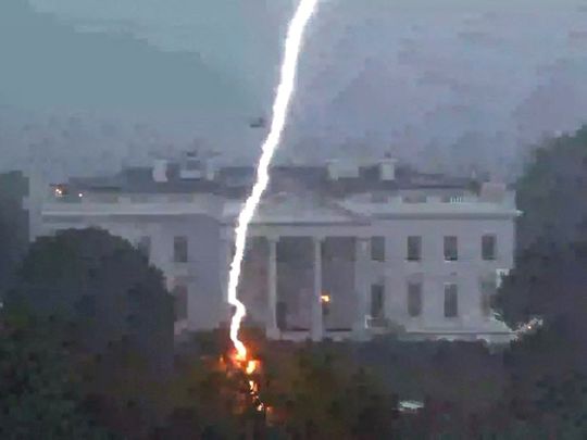 A lightning strike hits a tree in Lafayette Park across from the White House