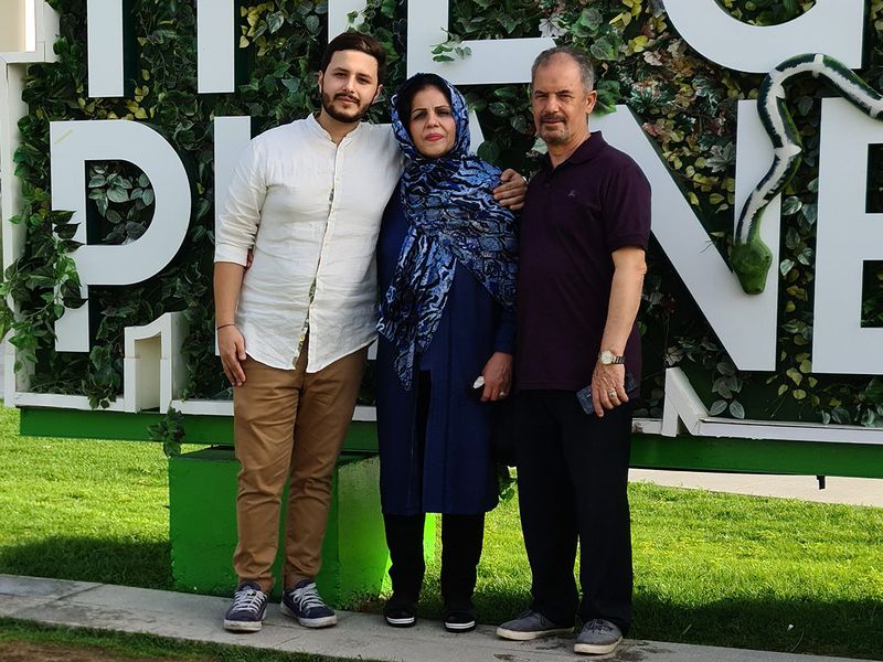 Family photo of Chef Ali Yazdi, Emirati food entrepreneur, owner of burger joint SLAW