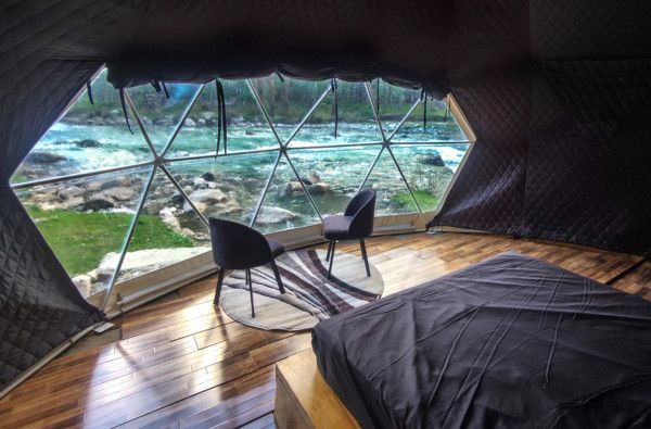 The Glamping travel experience brilliantly combines the charm of camping with luxury and comfort.  This interior view is at Khanabadosh glamping site in Pakistan-1660999602083