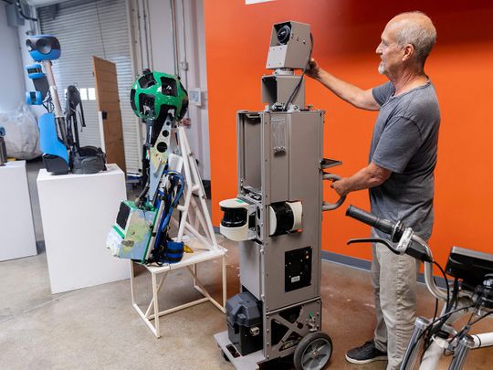Steven Silverman, Senior Technical Program Manager and Manager of Imagery Solutions for Google, shows off past Google Street View Camera devices at the Google Street View Garage in Mountain View, California. 