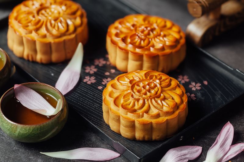 A mooncake is a Chinese bakery product traditionally eaten during the Mid-Autumn Festival