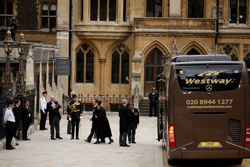 Attendees arrive at Westminster Abbey, on the day of the state funeral and burial of Britain's Queen Elizabeth, in London, Britain. 