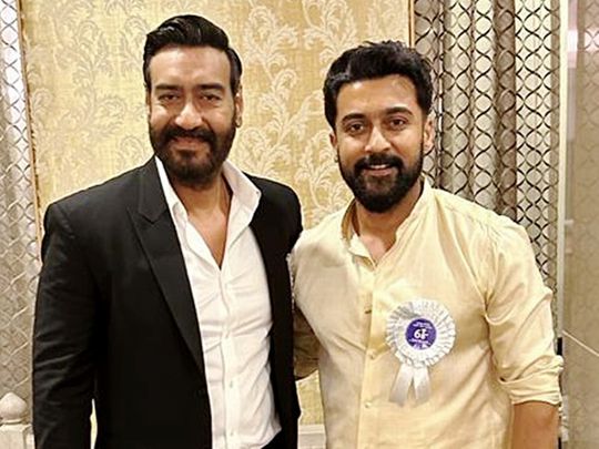 Actors Ajay Devgn and Suriya during the 68th National Film Awards